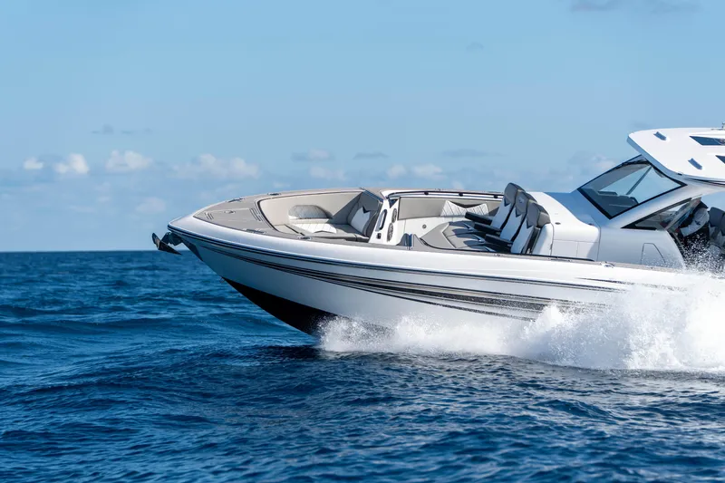 Slide: The Image of Luxurious interior of 2026 Deep Impact 449 Sport boat on open water. - 34