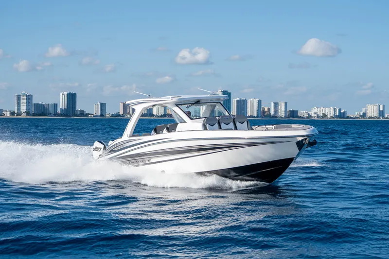 Slide: The Image of Luxurious seating on 2026 Deep Impact 449 Sport boat with ocean view. - 36