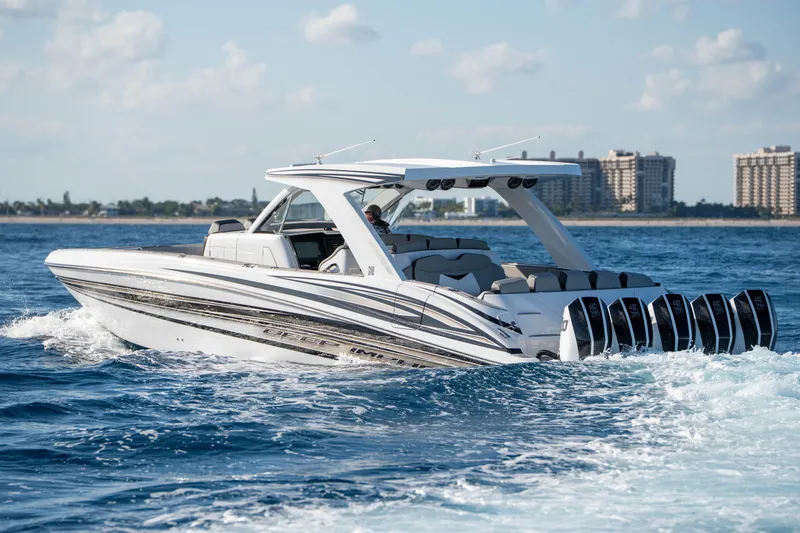 Slide: The Image of Luxury Deep Impact 449 Sport boat interior, 2026 model, cruising on clear blue ocean. - 44