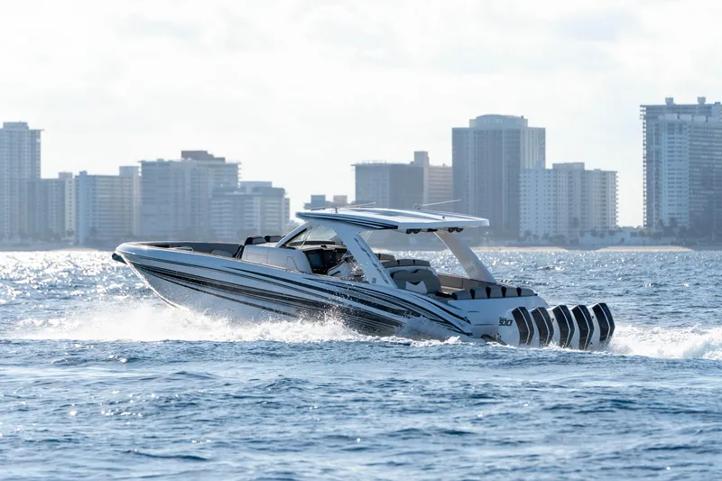 Slide: The Image of 2026 Deep Impact 449 Sport boat with advanced audio system and sleek design. - 45