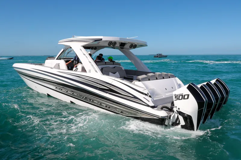 Slide: The Image of Aerial view of 2026 Deep Impact 449 Sport boat speeding on water. - 6