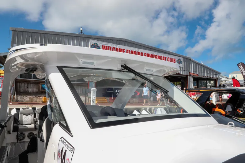 Slide: The Image of Aerial view of 2026 Deep Impact 449 Sport boat on clear green water. - 7