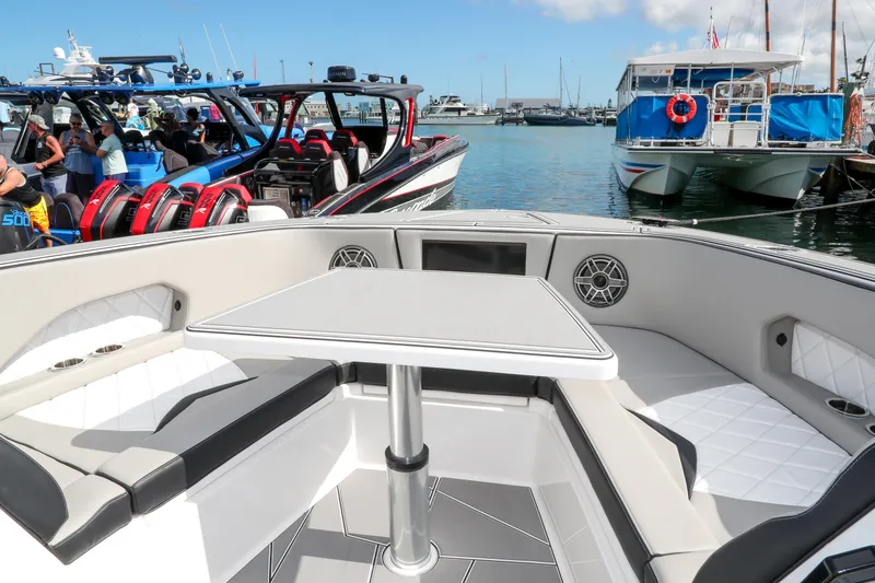 Slide: The Image of 2026 Deep Impact 449 Sport boat cruising on blue ocean waters. - 8