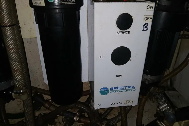 Slide: The Image of Spectra Watermakers control panel in a 1980 Hardin 45 boat engine room. - 65