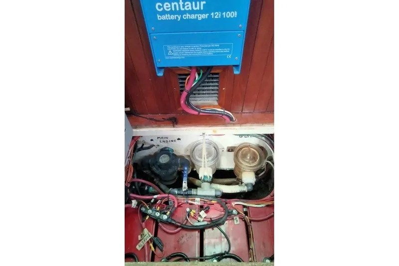 Slide: The Image of Engine compartment of a 1980 Hardin 45 with Centaur battery charger. - 69