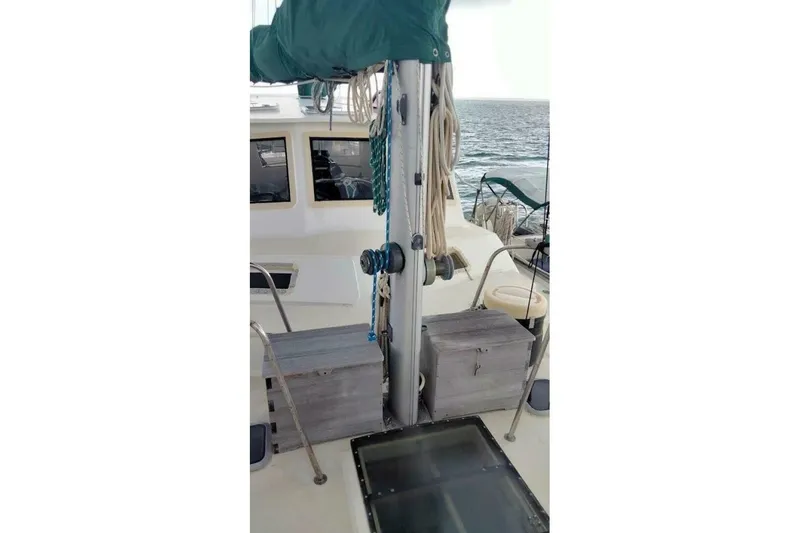 Slide: The Image of 1980 Hardin 45 sailboat deck with rigging and ocean view. - 90