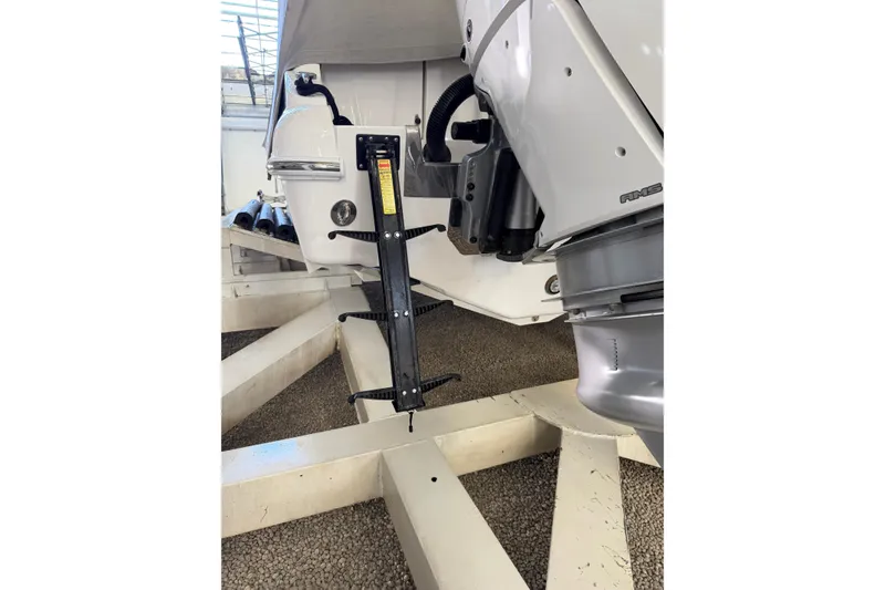 Slide: The Image of 2025 Deep Impact 369 Sport boat engine detail on display stand. - 35