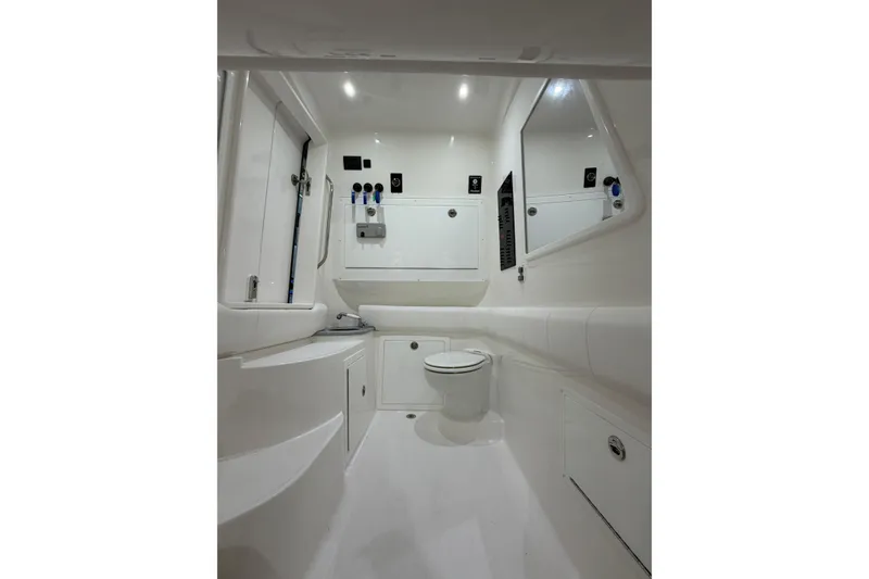 Slide: The Image of 2025 Deep Impact 369 Sport boat bathroom with modern fixtures and sleek design. - 8