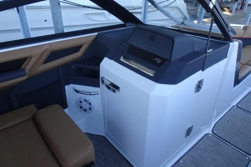Slide: The Image of 2026 Cobalt R8 Surf boat interior with modern dashboard and seating. - 21
