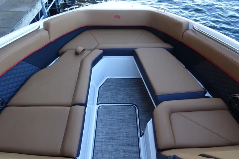 Slide: The Image of Luxurious interior of 2026 Cobalt R8 Surf boat with brown seating and modern design. - 23