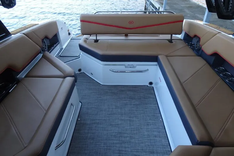 Slide: The Image of 2026 Cobalt R8 Surf boat interior with luxurious tan seating and modern design. - 27