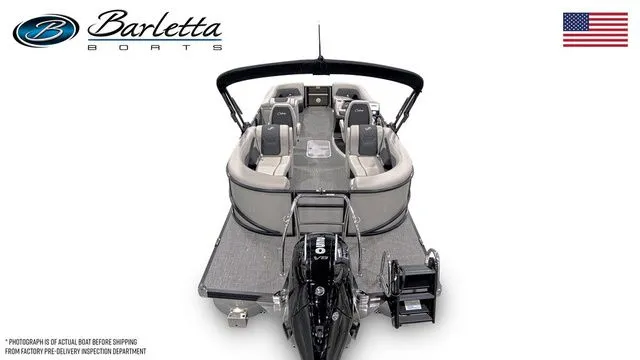 Slide: The Image of 2026 Barletta Boats Cabrio 24QC pontoon with sleek design and spacious seating. - 5