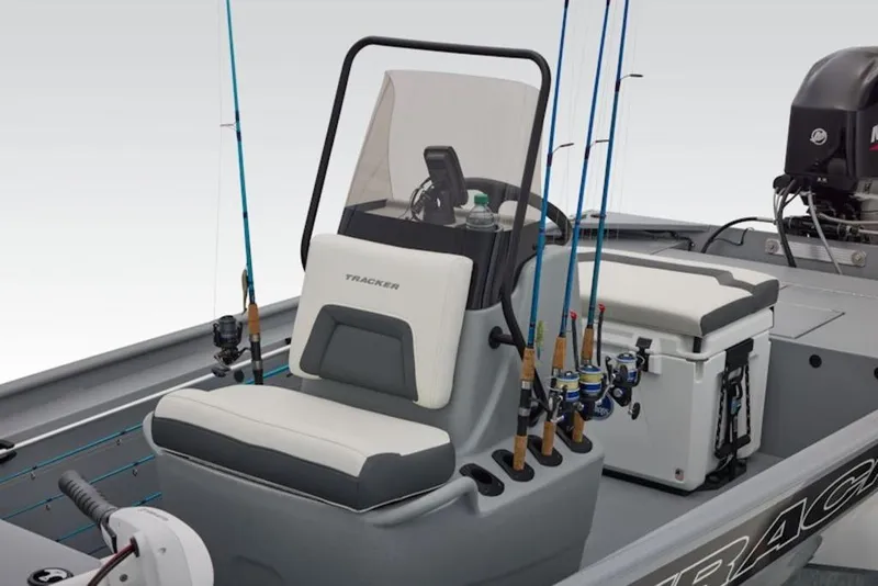 Slide: The Image of 2026 Tracker Bass Tracker Classic CC boat interior with fishing rods and seating. - 9