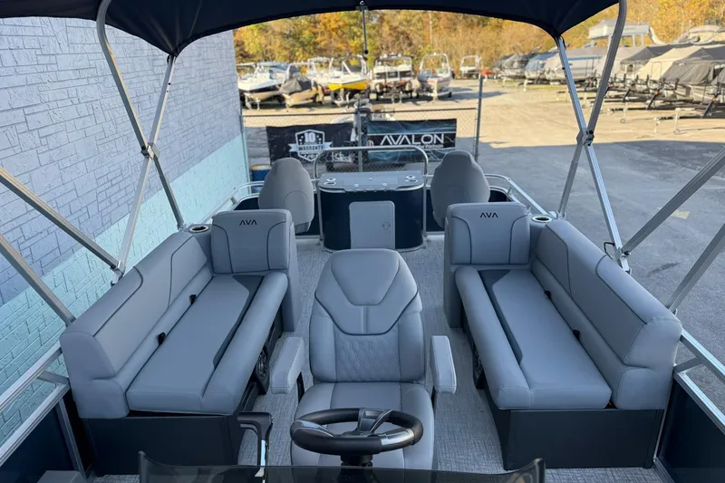 Slide: The Image of 2026 Avalon Venture 85 Center Fish 2385 pontoon boat with spacious seating and modern design. - 8