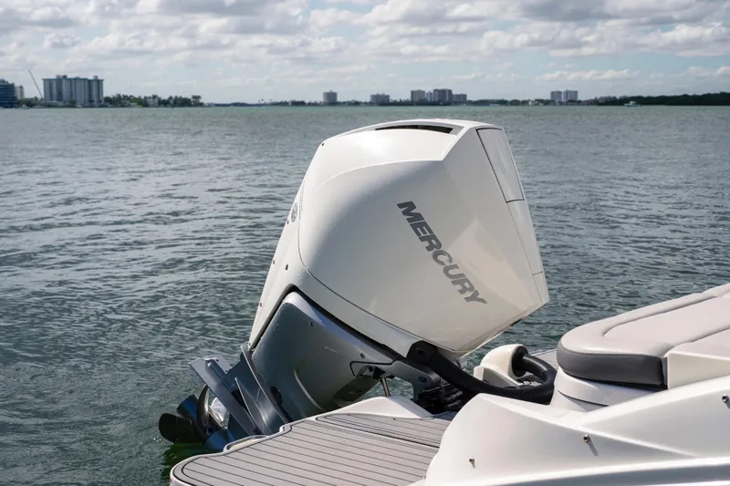 Slide: The Image of Yamaha AR250 boat with Mercury outboard motor on a calm lake, 2021 model. - 14