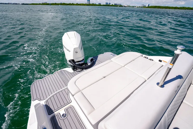Slide: The Image of 2021 Yamaha Boats AR250 with Mercury outboard engine on open water. - 15