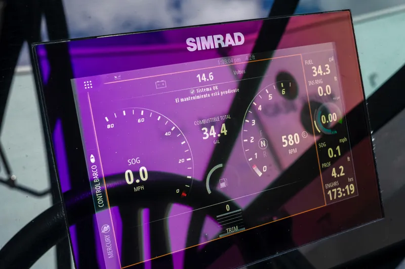 Slide: The Image of Simrad display on 2021 Yamaha Boats AR250 showing speed, fuel, and engine data. - 32
