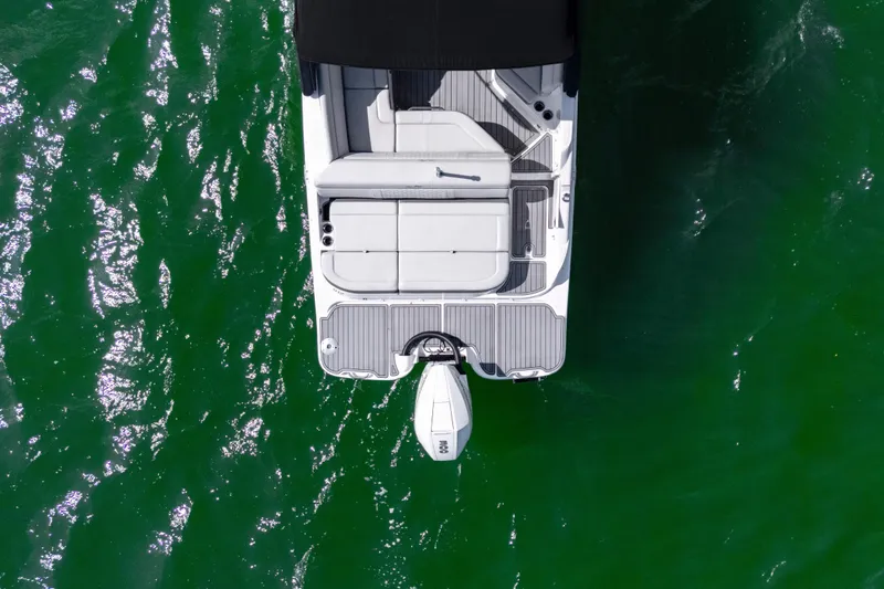 Slide: The Image of Top view of 2021 Yamaha AR250 boat on green water. - 9