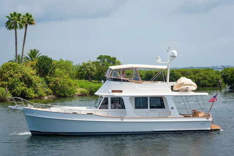 The Image of 2011 Grand Banks 47 Heritage EU yacht cruising on a scenic waterway. - 0