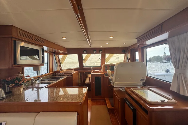 Slide: The Image of Luxurious interior of 2011 Grand Banks 47 Heritage EU yacht with elegant wood finishes. - 12