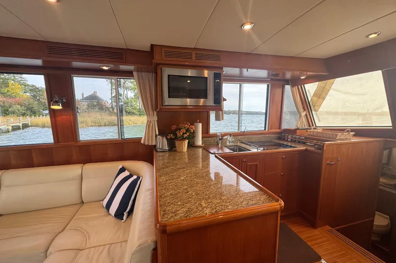 Slide: The Image of Luxurious interior of 2011 Grand Banks 47 Heritage EU yacht with elegant wood finishes. - 13