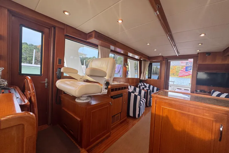 Slide: The Image of Luxurious interior of 2011 Grand Banks 47 Heritage EU yacht with elegant wood finish. - 16