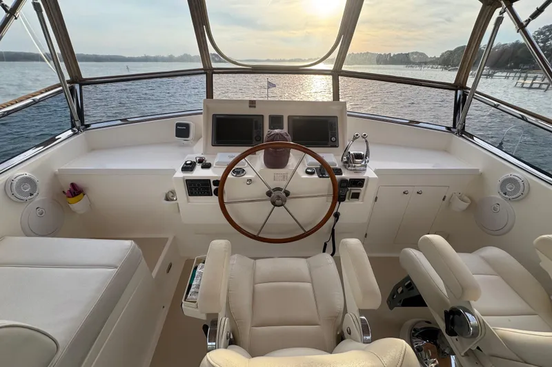 Slide: The Image of Helm of 2011 Grand Banks 47 Heritage EU yacht with steering wheel and navigation equipment. - 29