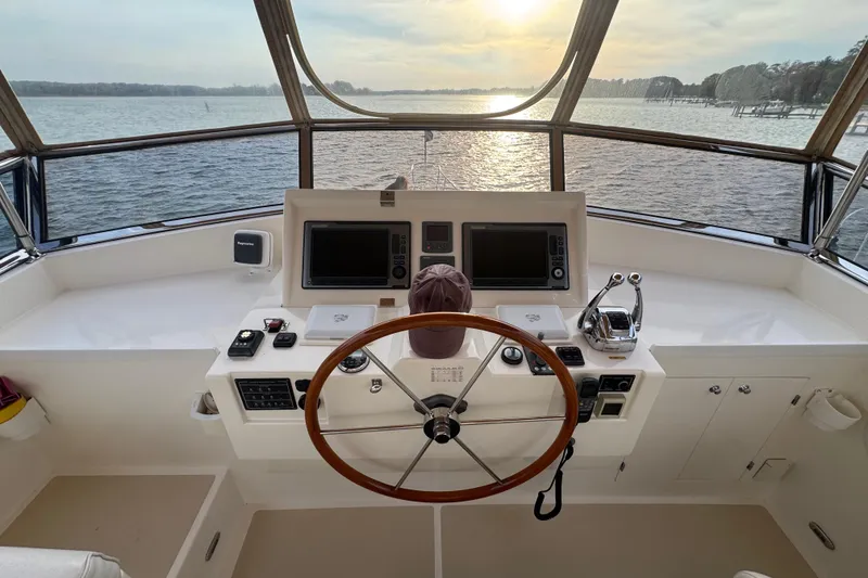 Slide: The Image of Helm of 2011 Grand Banks 47 Heritage EU yacht with scenic water view. - 30