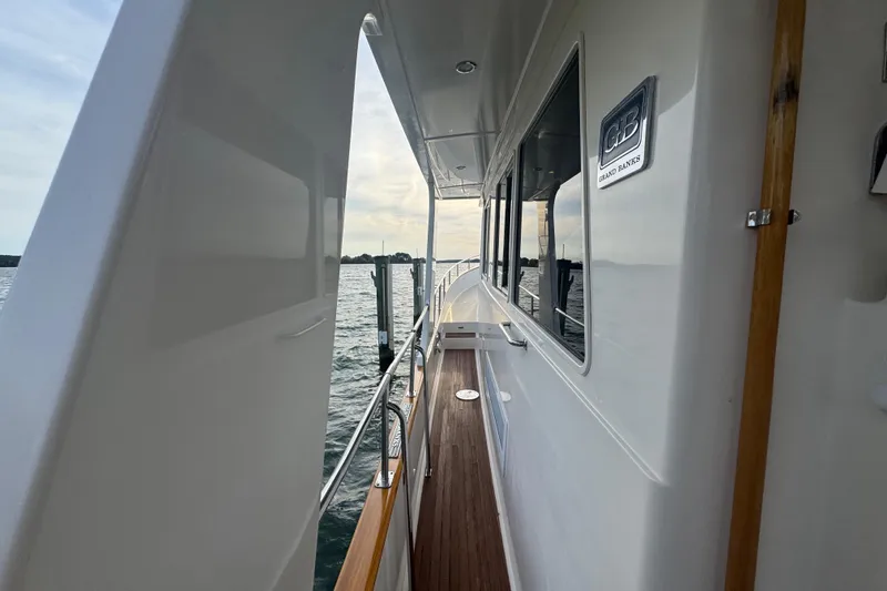 Slide: The Image of Side view of 2011 Grand Banks 47 Heritage EU yacht on water. - 39