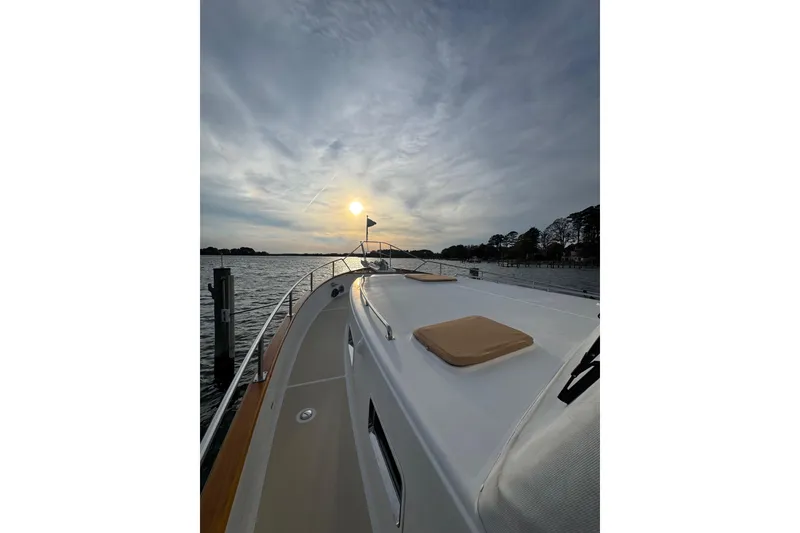 Slide: The Image of 2011 Grand Banks 47 Heritage EU yacht at sunset on calm waters. - 40