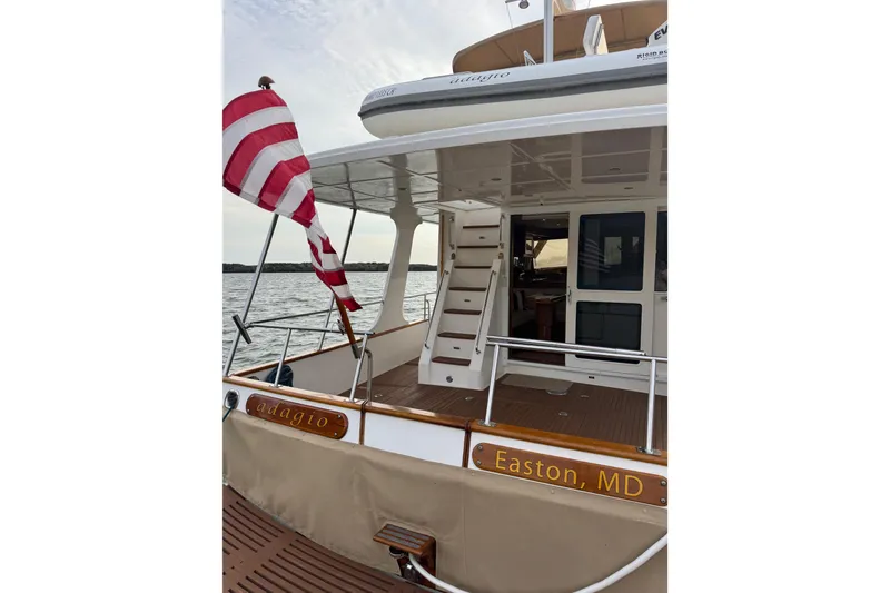 Slide: The Image of 2011 Grand Banks 47 Heritage EU yacht with American flag, docked in Easton, MD. - 42