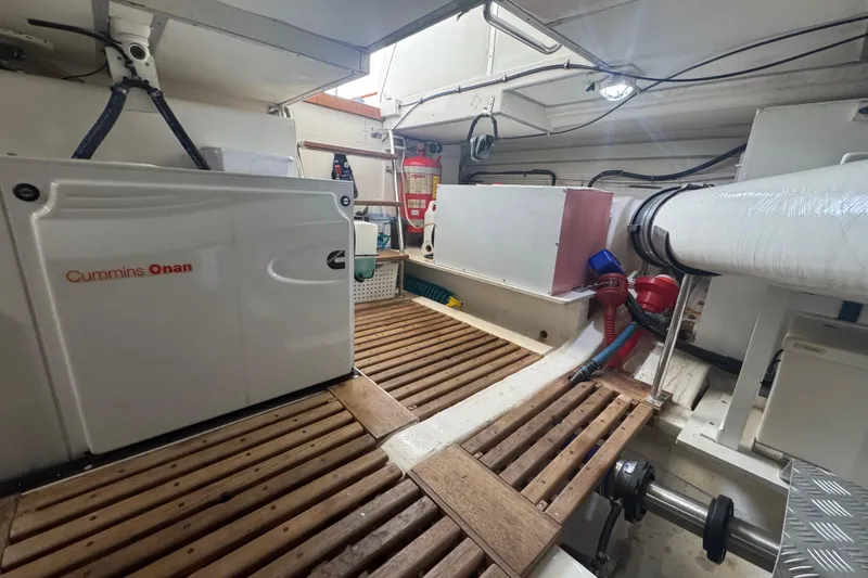 Slide: The Image of Engine room of 2011 Grand Banks 47 Heritage EU with Cummins Onan generator. - 46