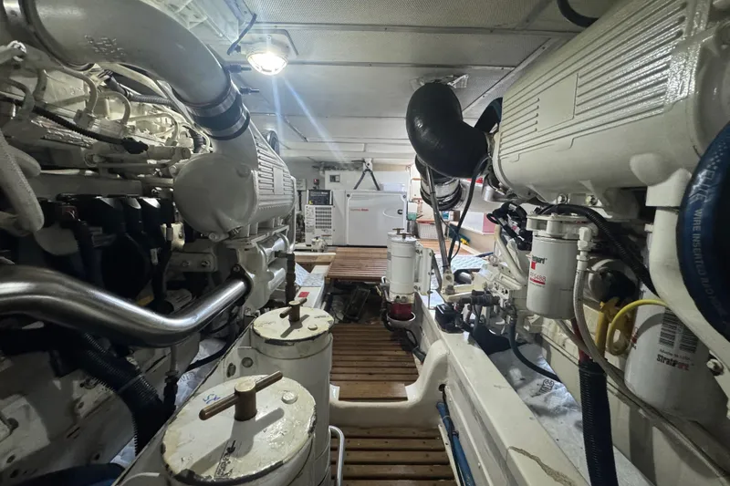 Slide: The Image of Engine room of 2011 Grand Banks 47 Heritage EU yacht, showcasing mechanical components. - 47