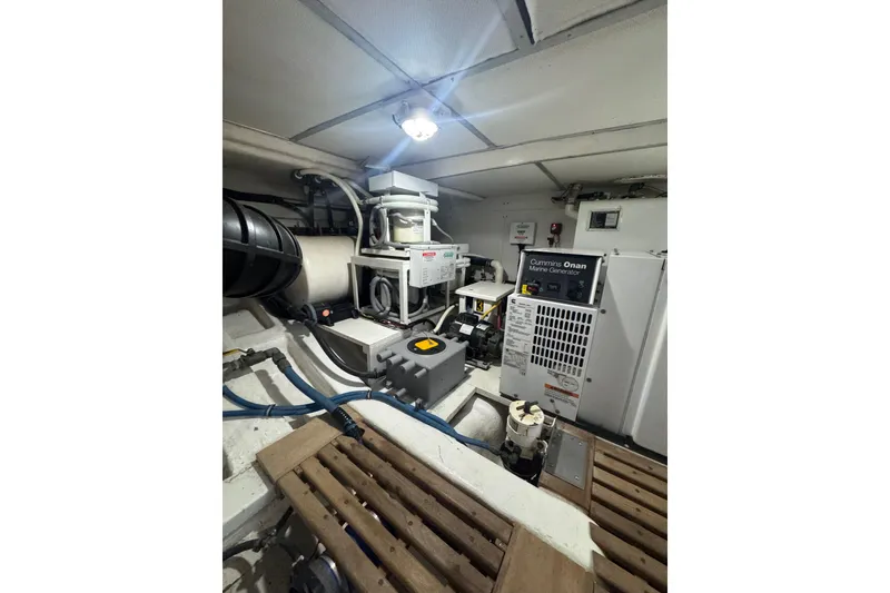 Slide: The Image of Engine room of 2011 Grand Banks 47 Heritage EU with Cummins Onan marine generator. - 48
