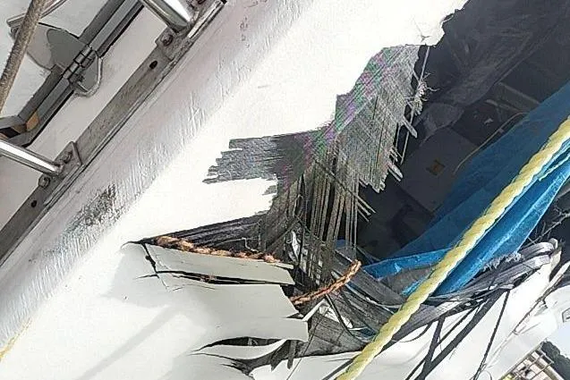Slide: The Image of Damaged hull of 2016 Mützelfeldtwerft Offshore Fast Crew Taxi Catamaran. - 10