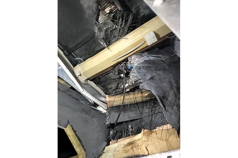 Slide: The Image of Damaged interior of 2016 Mützelfeldtwerft Offshore Fast Crew Taxi Catamaran. - 12