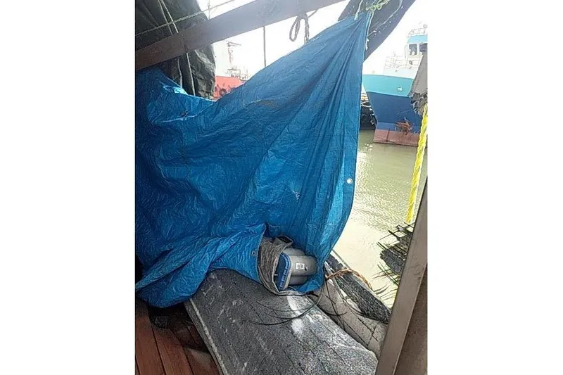Slide: The Image of Blue tarp covering equipment on a docked 2016 Mützelfeldtwerft Offshore Fast Crew Taxi Catamaran. - 22