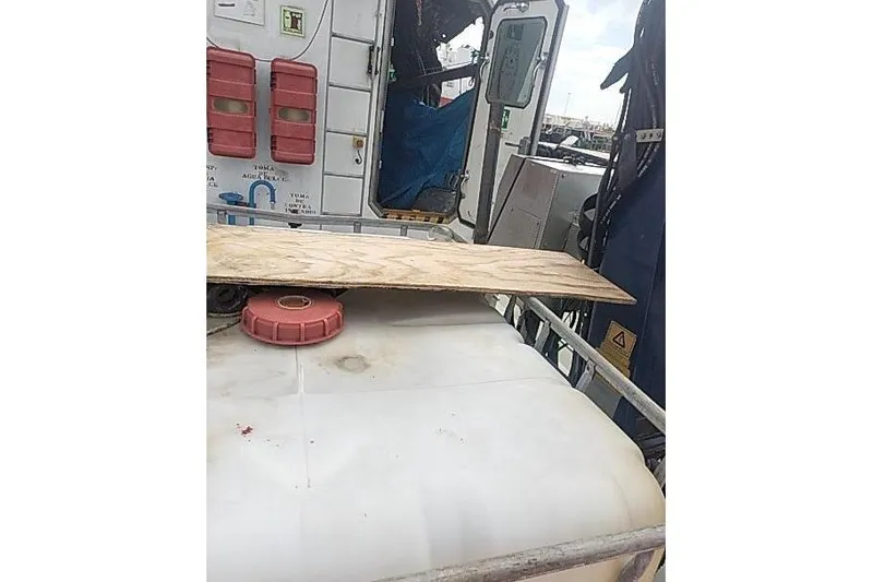 Slide: The Image of 2016 Mützelfeldtwerft Offshore Fast Crew Taxi Catamaran interior with equipment and safety gear. - 28