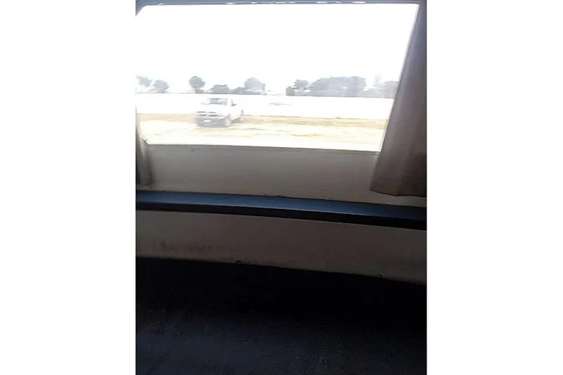 Slide: The Image of Interior view from Mützelfeldtwerft Offshore Fast Crew Taxi Catamaran, 2016, showing window and outside landscape. - 31