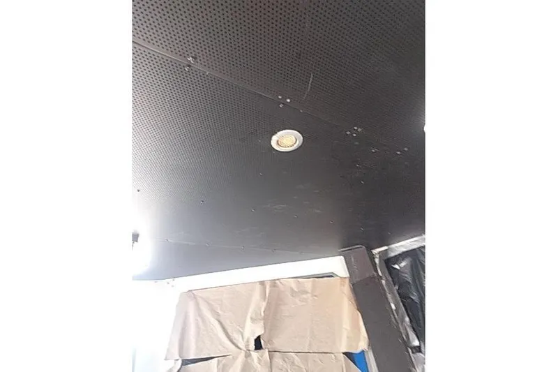 Slide: The Image of Interior view of Mützelfeldtwerft Offshore Fast Crew Taxi Catamaran, 2016, featuring a perforated ceiling. - 35