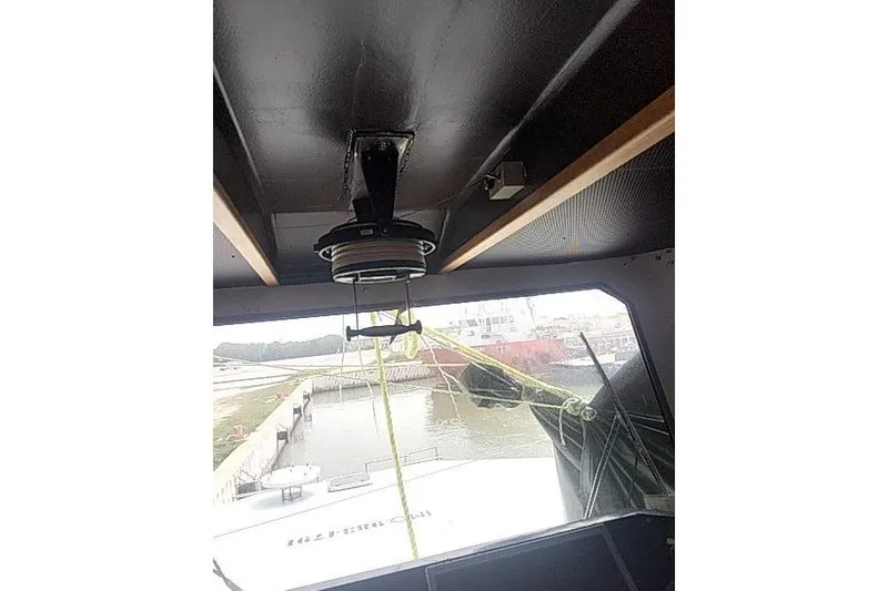 Slide: The Image of Interior view of 2016 Mützelfeldtwerft Offshore Fast Crew Taxi Catamaran, showing ceiling and window. - 36