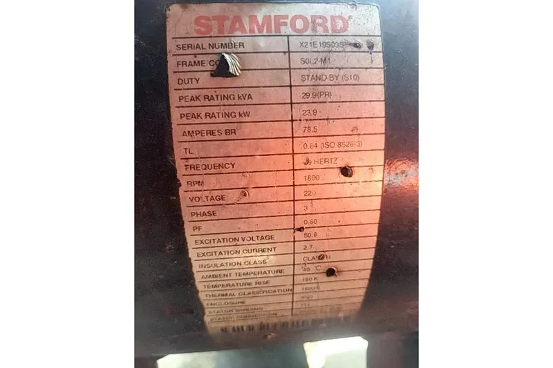 Slide: The Image of Label on Stamford generator detailing specifications and ratings, including voltage and frequency. - 56