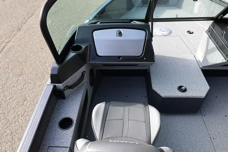 Slide: The Image of 2026 Lund 1675 Adventure Sport boat interior with seating and storage compartments. - 28