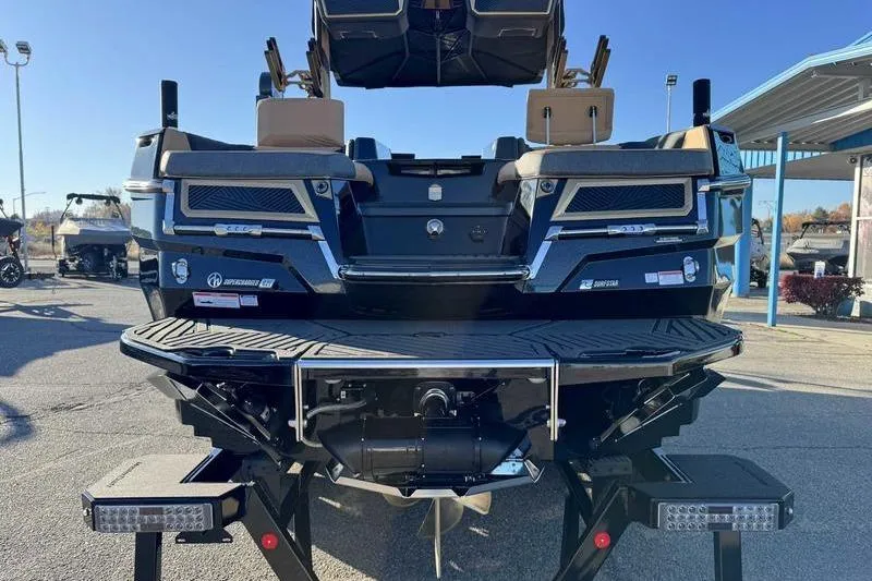 Slide: The Image of 2026 MasterCraft XStar 25 boat rear view, showcasing sleek design and modern features. - 21