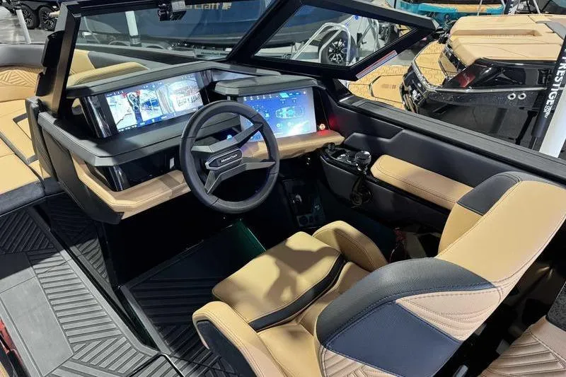 Slide: The Image of 2026 MasterCraft XStar 25 boat interior with modern dashboard and luxurious seating. - 26