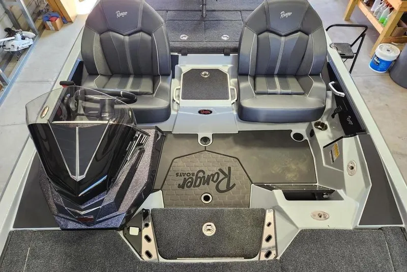 Slide: The Image of 2026 Ranger Z519R Cup-Equipped boat interior with dual seats and sleek console design. - 7