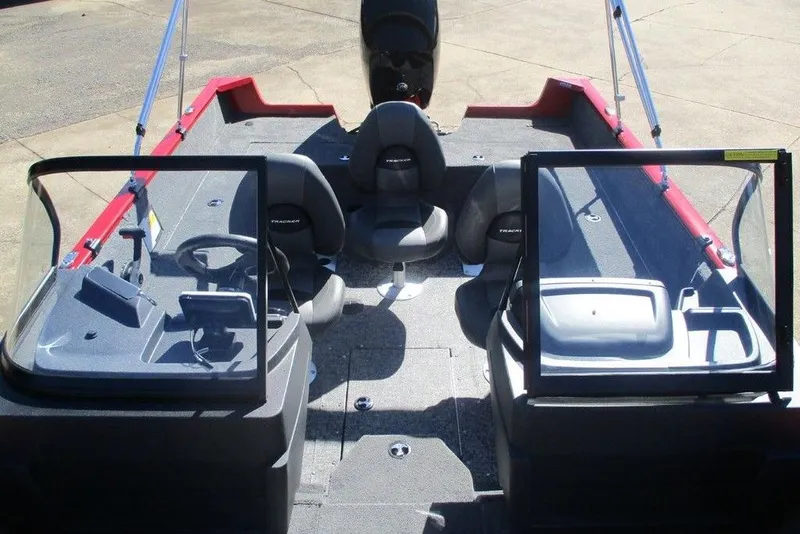 Slide: The Image of 2026 Tracker Pro Guide V-175 WT boat interior with seating and steering console. - 10