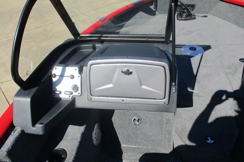 Slide: The Image of 2026 Tracker Pro Guide V-175 WT boat interior with storage compartment and windshield. - 13