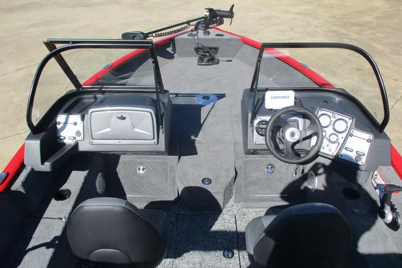 Slide: The Image of 2026 Tracker Pro Guide V-175 WT boat interior with steering console and seating. - 9
