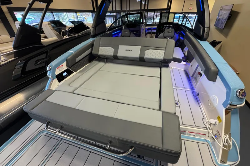 Slide: The Image of 2026 Chaparral 267 SSX boat interior with luxurious seating and modern design. - 10